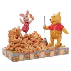 Enesco Disney - Winnie The Pooh - Figurine 14 Cm - Showcase Collection - Jumping Into Fall